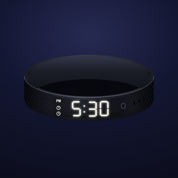Tiptoe Band in Midnight (black): a slim silicone strap with white LED digits showing 5:30